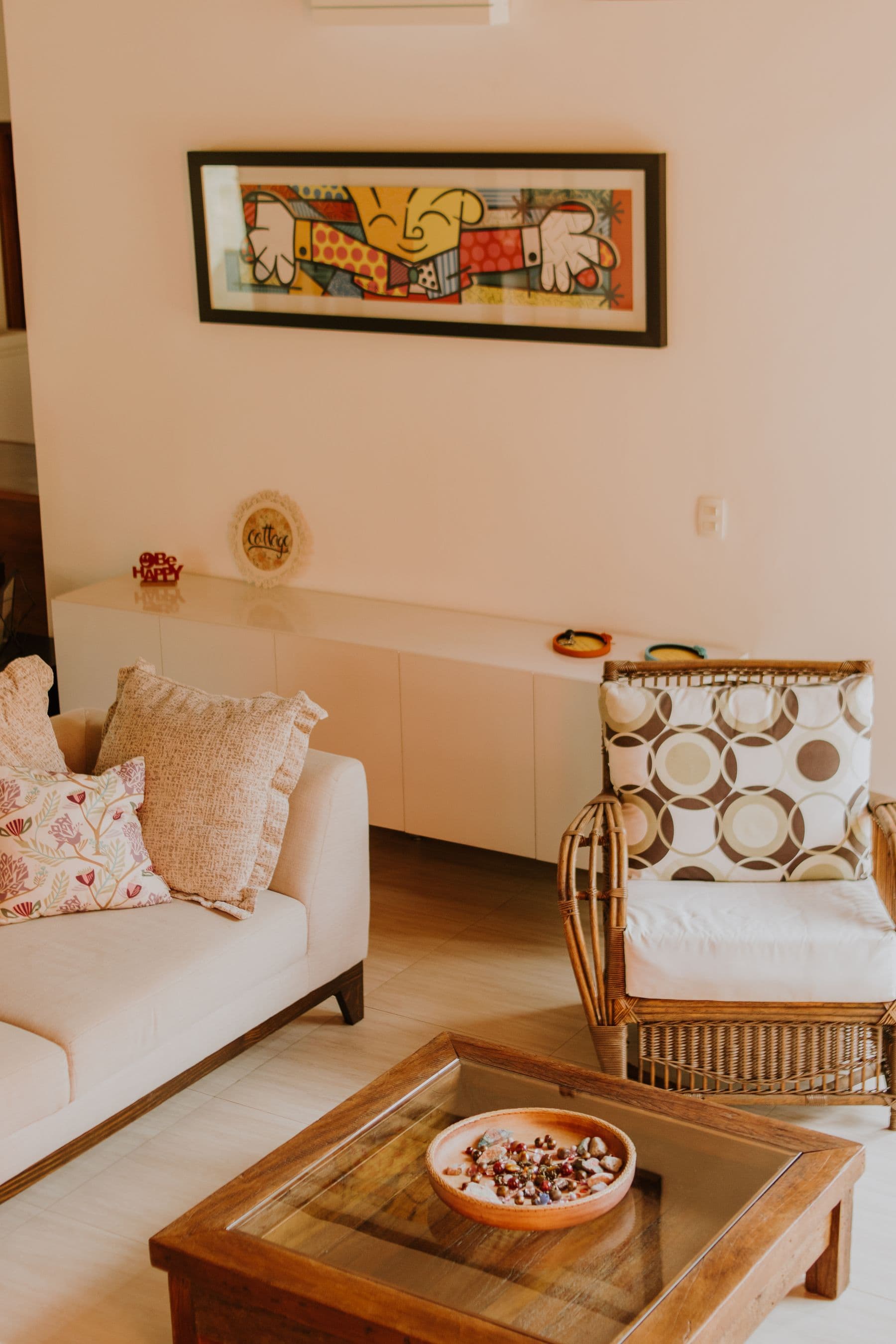Living room with exposed chestnut beams and juliet balcony doors open to the lane
