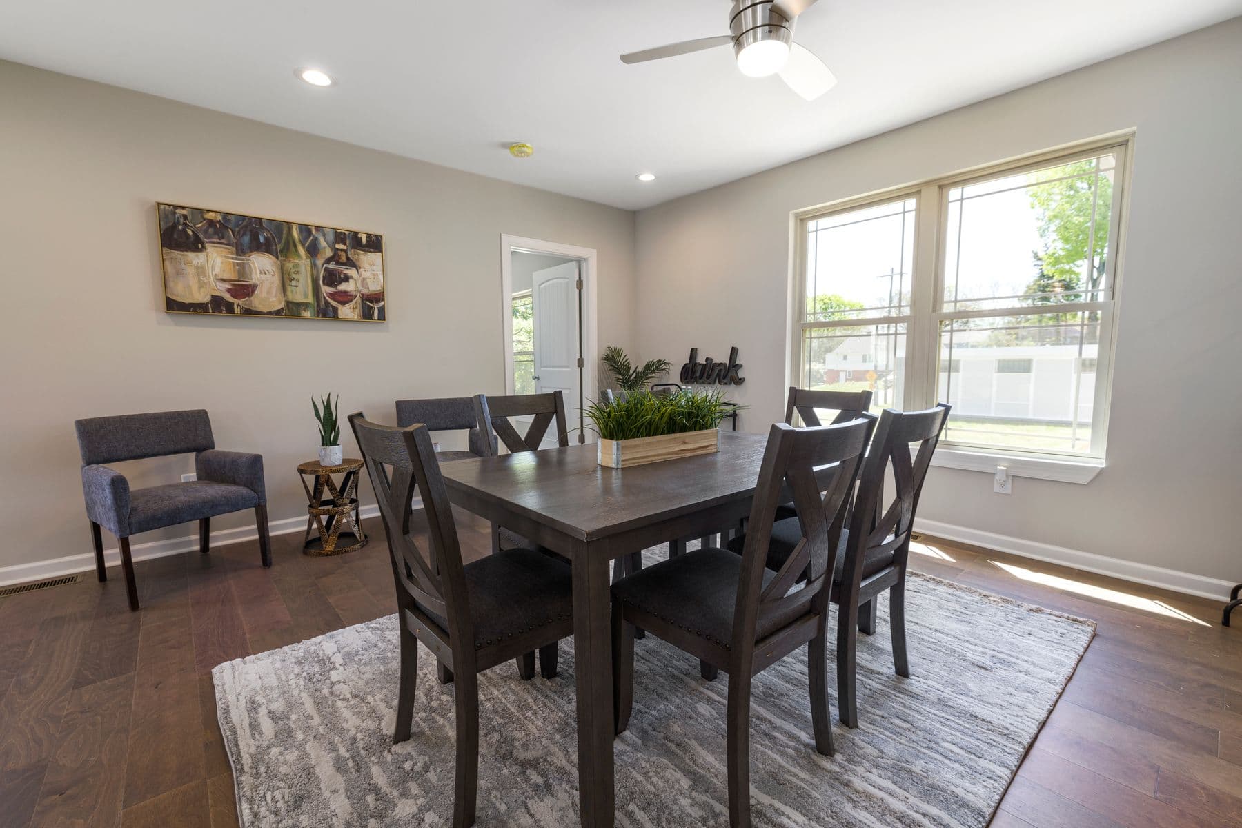 Indoor dining table for ten between the open kitchen and the sitting room