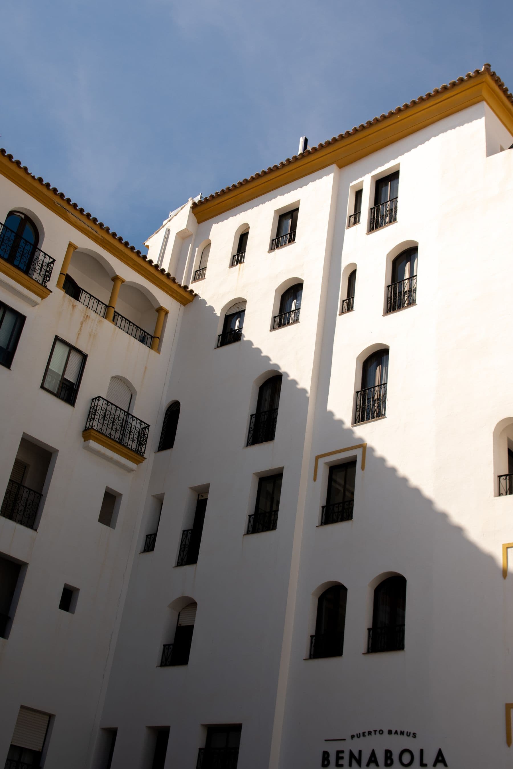 Penthouse Marea's building one row back from the Puerto Banús marina, the duplex on the top two floors