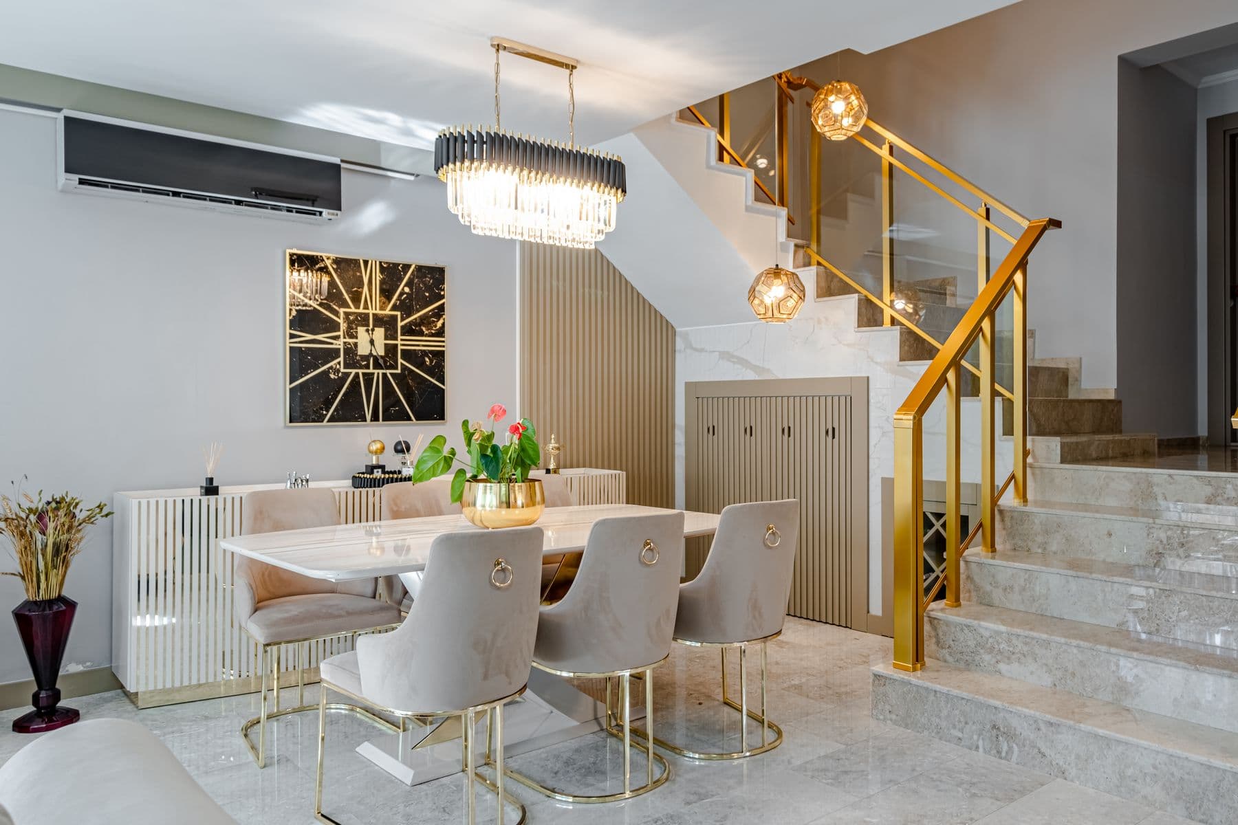 Indoor dining table for twelve beside the open kitchen