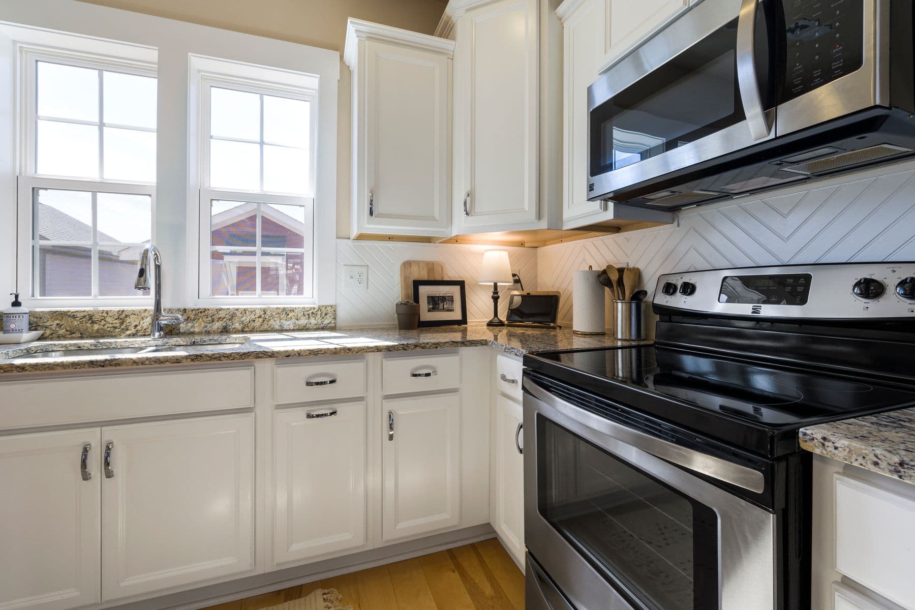 Family kitchen with induction hob, full oven and large fridge-freezer